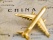 Avion miniature sur une carte de la Chine
