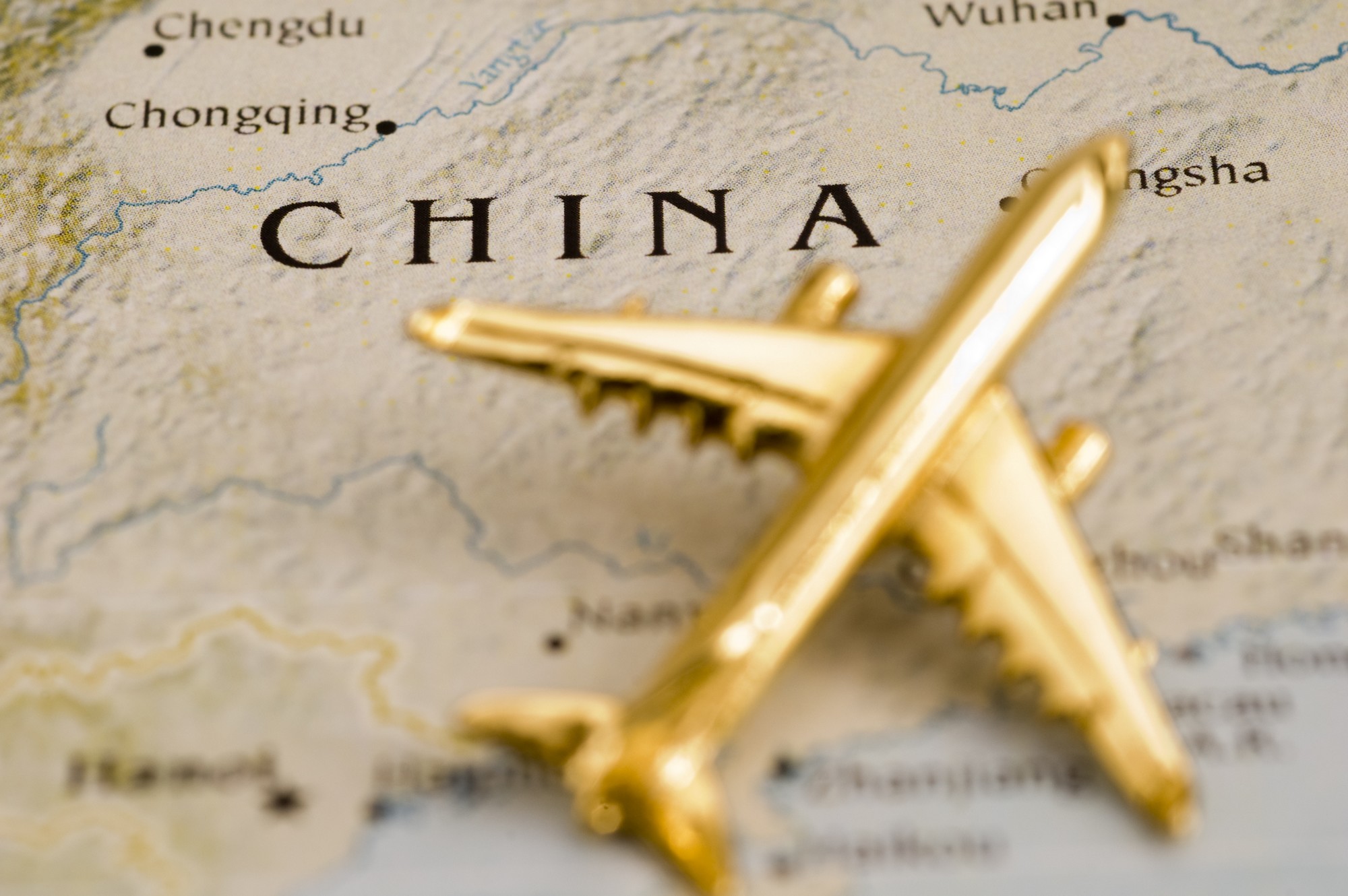 Avion miniature sur une carte de la Chine